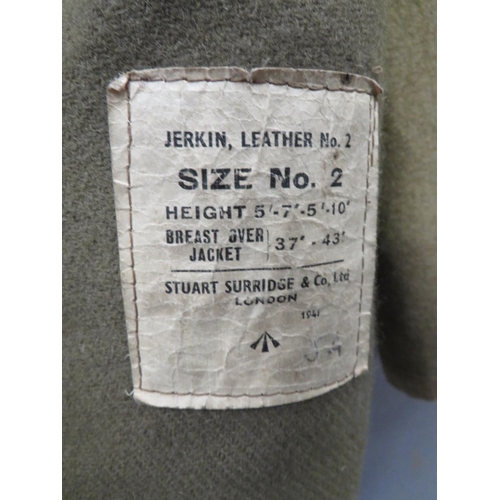 351 - 1941 Dated Leather Jerkin
brown leather, multi panel, single breasted, sleeveless jerkin.  The front... 