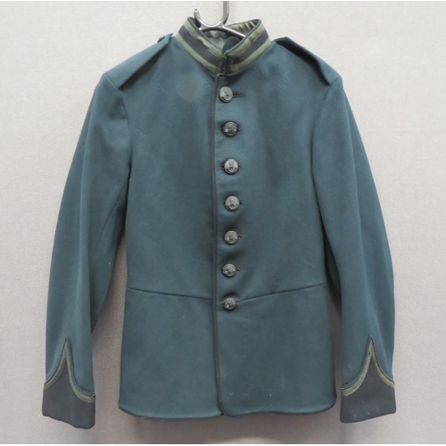 Pre WW1 Rifles Other Ranks Tunic
dark green woollen, single breasted tunic.  High black collar with green braid edging.  Matching cuffs.  Horn, KC Rifles buttons.  Internal cream, half blanket lining.  Paper issue label dated Apr. 1914.  