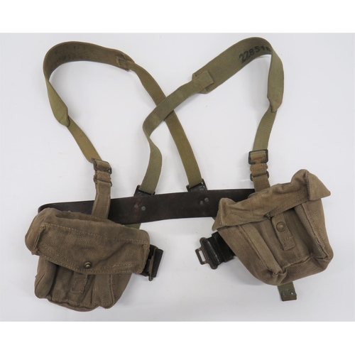 402 - Pair of Home Guard Ammunition Pouches
khaki webbing, square form pouches.  Top flap secured by ... 