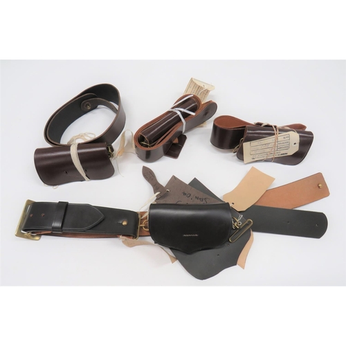 411 - Four Manufacturer Sample Cross Belts and Pouches
consisting dark brown leather pouch and strap with ... 