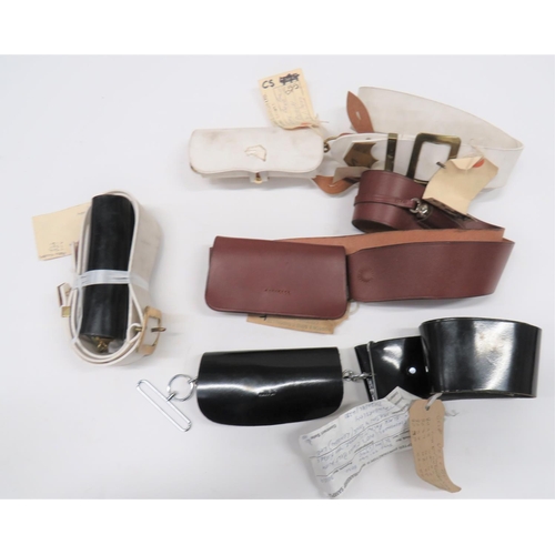 416 - Four Manufacturer Sample Cross Belts and Pouches
consisting brown leather pouch and strap with brass... 