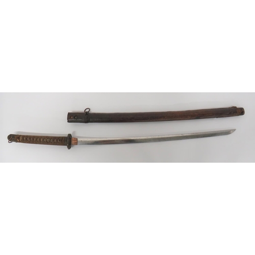 72 - WW2 Military Mounted Japanese Officer's Katana Sword
28 1/2 inch, single edged blade.  Good wavy ham... 