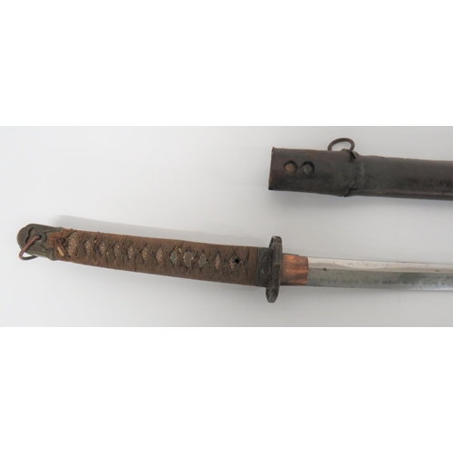 72 - WW2 Military Mounted Japanese Officer's Katana Sword
28 1/2 inch, single edged blade.  Good wavy ham... 