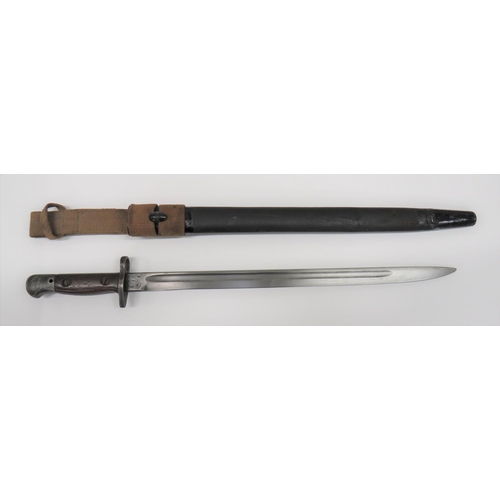 British 1907 SMLE WW1 Bayonet
17 inch, single edged blade with fuller.  Forte with maker 'Wilkinson" dated 5/15.  Blued steel muzzle ring, crossguard and pommel.  Polished wooden slab grips.  Contained in its leather scabbard with steel mounts.  Complete with 1937 pattern webbing frog.  Old repair to throat.  