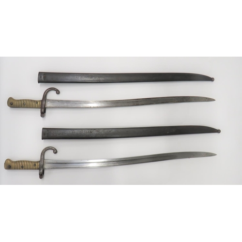 80 - Two French M1866 Chassepot Bayonets
22 1/2 inch, single edged, yataghan blades with fuller.  Re... 