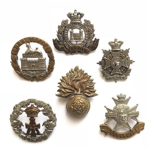 109 - 6 Victorian Infantry cap badges.  Dorsetshire ... Suffolk ... Border ... Yorkshire ... Royal Fusilie... 