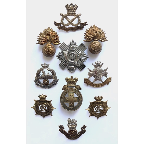 134 - 10 Victorian cap badges.  2 x Royal Fusiliers ... South Staffordshire ... East Lancashire ... Highla... 