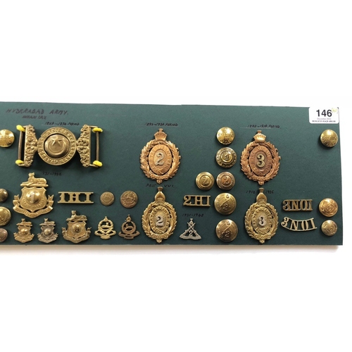 146 - Indian. Hyderabad Army 41 items of insignia.   Good carded selection of a few Cavalry but mainly Inf... 