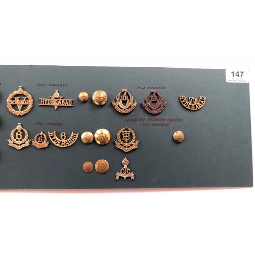 147 - Indian. Hyderabad Army 33 items of insignia.  Good carded selection of Infantry head-dress and pagri... 