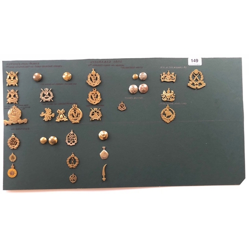 149 - Indian. Hyderabad Army 32 items of insignia.  Good carded selection of various Cavalry, Volunteers, ... 