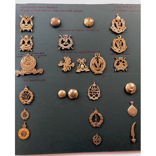 149 - Indian. Hyderabad Army 32 items of insignia.  Good carded selection of various Cavalry, Volunteers, ... 