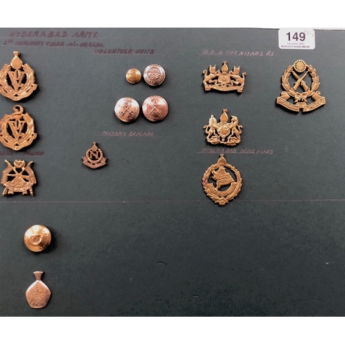 149 - Indian. Hyderabad Army 32 items of insignia.  Good carded selection of various Cavalry, Volunteers, ... 