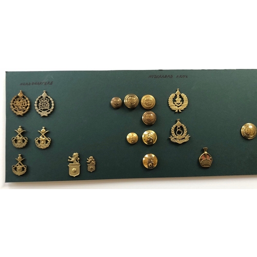 152 - Indian. Hyderabad Army 24 items of insignia.  Good carded selection of HQ and Artillery head-dress a... 