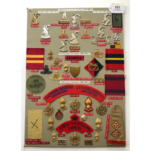 161 - Rhodesian Armoured Car Regiment, Artillery and Engineers 51 items of insignia.  Board with good  dis... 