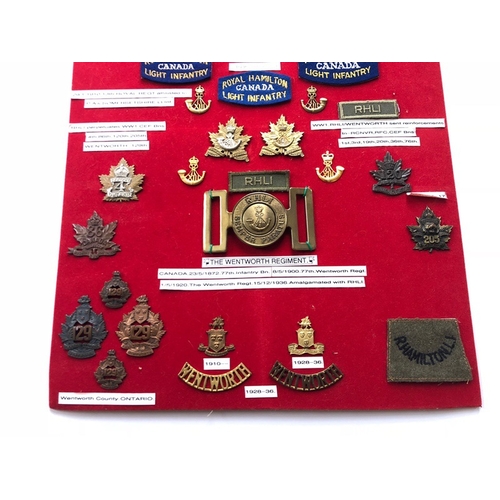 163 - Canada. Royal Hamilton Light Infantry/Wentworth Regiment 42 items of insignia.  Board with good  dis... 