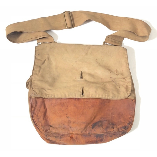 WW1 Machine Gun Corps Officer Attributed Side Bag.  A good example of the regulation side bag, canvas and leather with web shoulder strap. The interior with an ink name of I A Thomas MGC. Some age wear, buttons absent GC.        Possibly carried by Second Lieutenant Ivan Arthur Thomas who landed in France after the 1st January 1916 and was Killed in Action on the 10th June 1917