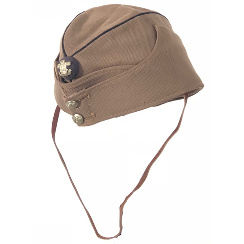 355 - Ceylon Mounted Rifles Field Service Cap circa 1900-38.  A good, scarce example of grey cloth with bl... 