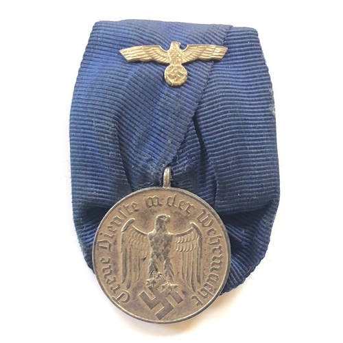 374 - German Third Reich Army 4 year long service medal.  A good silvered example with silver eagle and sw... 