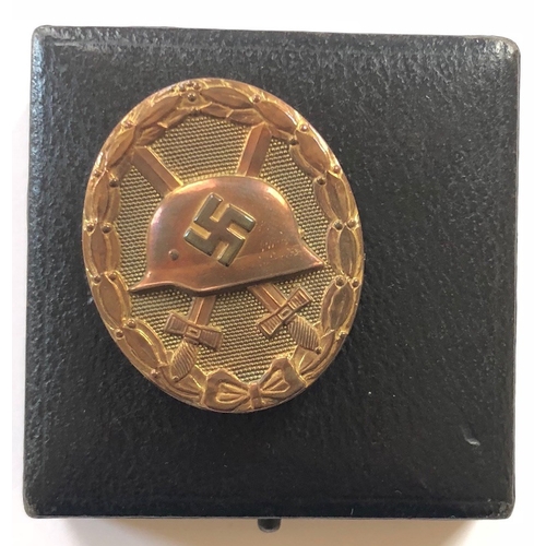 387 - German Third Reich 1939 Wound Badge in gold in case of issue by Friedrich Orth, Wien.  A good die-ca... 