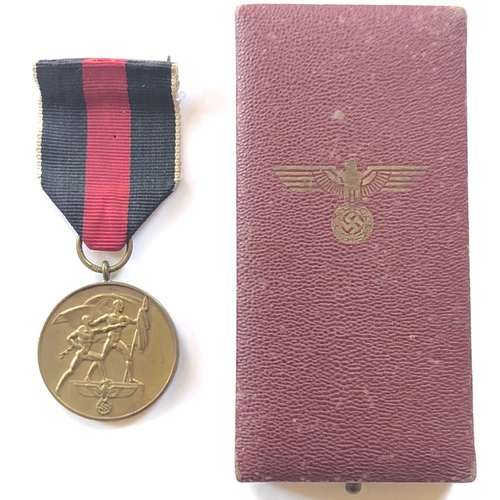 395 - German Third Reich cased Medal for the Entry into Czechoslovakia.  A good bronzed medal commemoratin... 