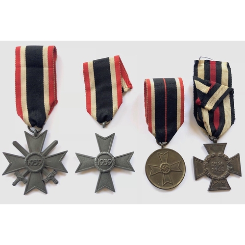 German Third Reich 4 assorted medals.  1939 War Merit Cross, 2nd Class with swords ...  1939 War Merit Cross (suspension ring broken off but present) ... 1939 War Merit Medal ... Hindenburg Cross for non-combattants (R.V. 67, PFORZEIM). (4 items)