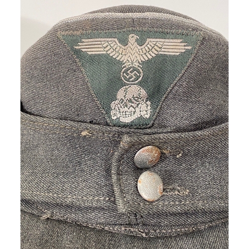 424 - German Third Reich Waffen SS Officer M43 field cap  A fine example of grey gaberdine with rayon lini... 