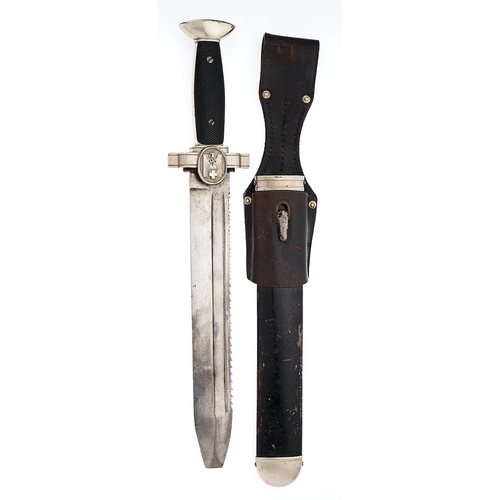 German Third Reich Red Cross hewer and frog.  Good scarce example with unmarked sawback blade. Nickel plated mounts with oval on crossguard bearing eagle and swastika with Geneva cross. Two piece Bakelite grip, the front section of chequered design, the reverse plain. Housed in its black painted scabbard with nickel plated throat and chape ; complete with dark brown leather frog, with aluminium rivets, bearing feint K impressed into the leather. Minor service wear, generally VGC.        Introduced in February 1938 and discontinued in 1940.