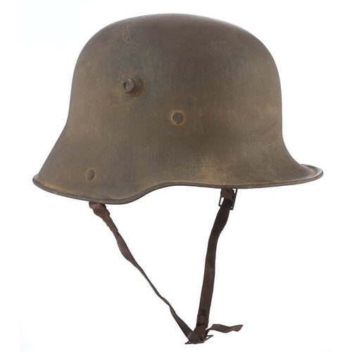 445 - WW1 Imperial German Steel Helmet. A good untouched Great War helmet retaining original green painted... 