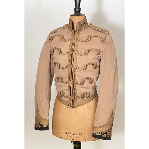 Indian Army Frontier Force Officer Mess Uniform. A good scarce example of Rifle pattern, beige melton cloth with green facings to cuff and collar. Each is decorated with mohair lace. Mohair plated shoulder cords rank stars now absent. To front five mohair gimp cord loops with loop and olivette facings. Quilted cotton lining to the interior, with tailors label of Rankin & Co. Accompanied by trousers, these with tailor label and ink name inscription possible Major Hinde and date 19th November 1913. (2 parts)