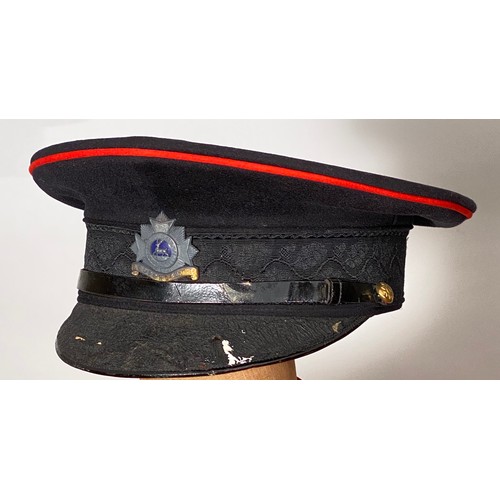 363 - Bedfordshire Regiment Officer Home Service Helmet and Uniforms A collection of uniforms worn by Seco... 