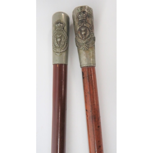 234 - Two Victorian Royal Scots Fusiliers Swagger Sticks
consisting white metal thimble tops embossed with... 