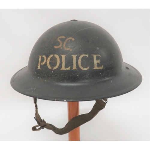 295 - Police Special Constabulary MKII Steel Helmet
black painted outer shell.  The front with white stenc... 