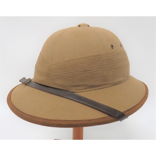 305 - WW2 Pattern Private Purchase Pith Helmet
khaki, six panel, low crown.  Oval brim with leather edging... 