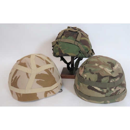 312 - Three Various British Post War MK6 Helmets
green composite fibre shells.  Leather, rubber and webbin... 