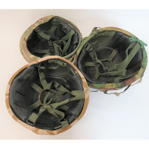 312 - Three Various British Post War MK6 Helmets
green composite fibre shells.  Leather, rubber and webbin... 