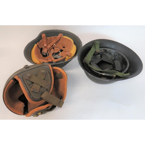 317 - Three Various Helmets
consisting American tank pattern, fibre crown helmet.  Fold down leather ... 