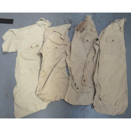 328 - Four Various Tropical Bush Shirts
consisting 2 x khaki tan cotton, half fastened front shirt with pl... 