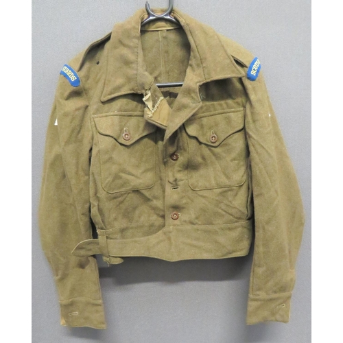 331 - 1940 Pattern Battledress Jacket
khaki, woollen, single breasted, converted open collar, short jacket... 