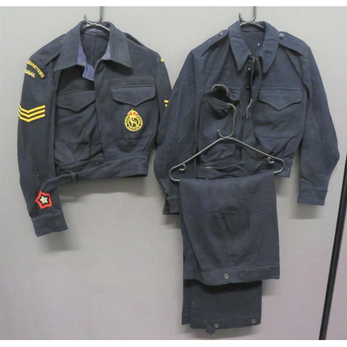 333 - Post War Woman's Civil Defence Battledress and Trousers
consisting dark blue, single breasted, close... 