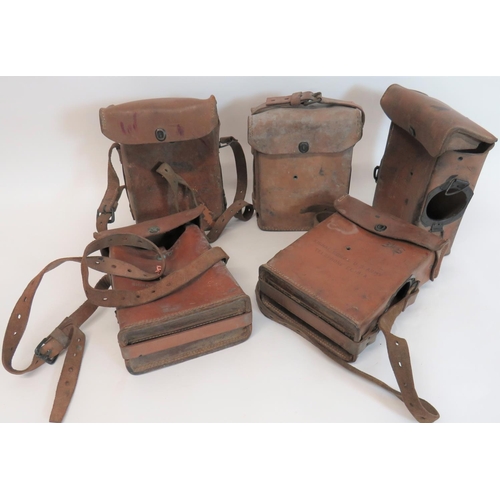 Five US Army Signal Corps Leather Telephone Cases
leather rectangular cases.  Top flap secured by blackened press studs.  One side with reinforced hole for the winding handle.  Fronts with "Signal Corps US Army.  Telephone EE-8-A".  5 items.