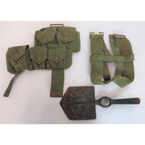 1908 Pattern Webbing Equipment
consisting right side, 5 pouch set.  Brass press stud fastening to the pouch flaps.  Rear belt loops and equipment strap ... 1908 pattern webbing waterbottle cradle ... Steel entrenching tool head.  No visible date stamp.  3 items.