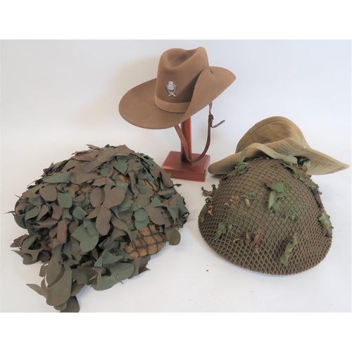 360 - Four Various Hats and Helmets
consisting 1953 dated, khaki, felt slouch hat.  Single braid pagr... 