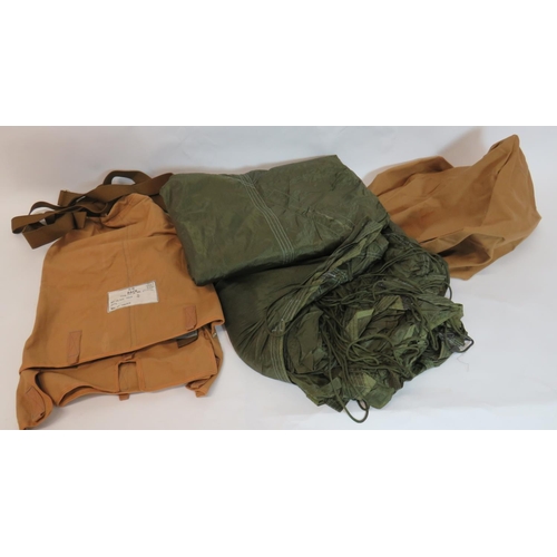 391 - Post War GQ Parachute Pack
tan canvas, internal parachute holding pack complete with long nylon stat... 