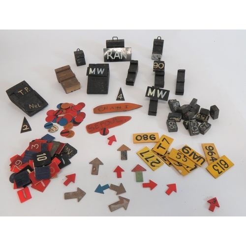 Good Selection of Aircraft Plotting Markers
including 10 x various wooden plotting stands ... Various numbers and letter markers ... Card arrow markers ... Coloured disc markers ... Wooden blocks with painted numbers.  Quantity.