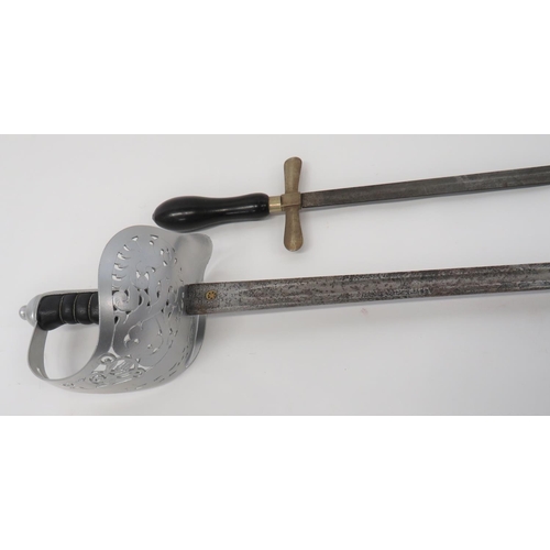 424 - 1897 Pattern Infantry Officer's Sword
32 1/2 inch, dumbell blade with central fuller.  Traces o... 