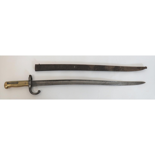 French M1866 Chassepot Bayonet
22 1/2 inch, single edged, yataghan blade with wide fuller.  Back edge with faint maker details.  Steel muzzle ring and hook quillon.  Brass ribbed grip.  Contained in its steel scabbard.  