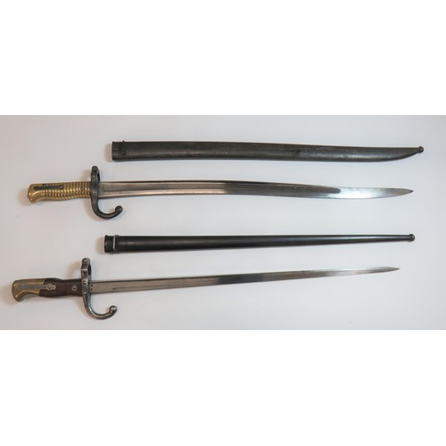 436 - Two French BayonetsConsisting French Chassepot Bayonet 22 1/2 inch, single edged, yataghan blade wit... 