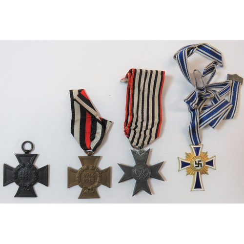 231 - Selection of German Medals
consisting WW2 German Mothers Cross in gilt and enamel ... Bronzed 1914-1... 