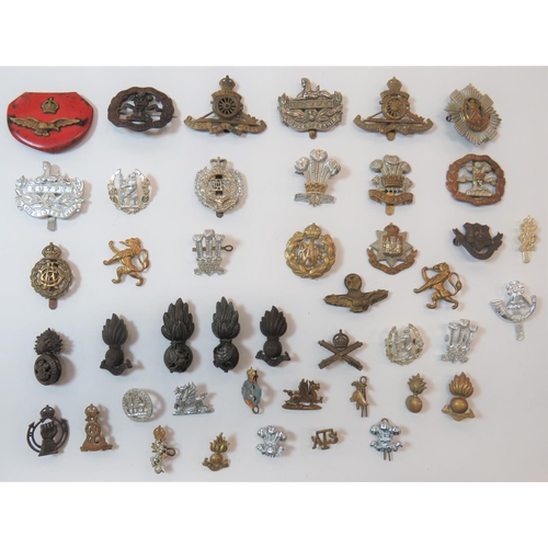 Various Military Cap and Collar Badges
cap badges include bronzed Royal Welsh Fusiliers (blades) ... Bi-metal South Lancashire (brooched) ... White metal Gloucestershire ... Anodised Gloucestershire ... Brass, 2 part KC RAF ... Bi-metal Royal Scots ... Brass KC RA ... Bi-metal The Welch .  Collars include facing pair, bronzed Royal Welsh Fusiliers ... Bronzed Loyal North Lancashire ... Bronzed KC MGC ... Pair bronzed RA ... Bronzed KC RAC.  40 + items.