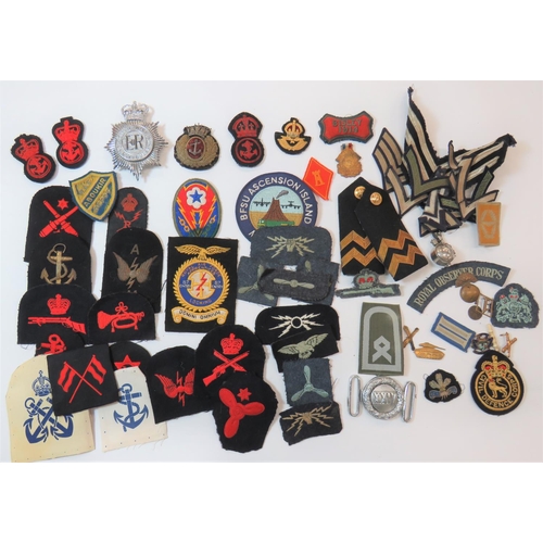 Quantity of Various Military Badges
including chrome QC South Wales Constabulary helmet plate ... Chrome XXIV Reg buckle ... Gilt KC RAF beret badge ... Bullion embroidery Merchant Navy cap badge ... Bullion embroidery Bisley 1914 arm badge ... American rank stripes ... Royal Navy trade badges.  Quantity.